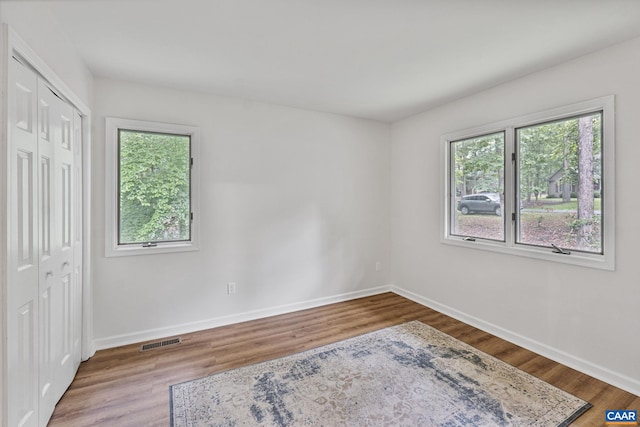 7 Sand Trap Ter, Palmyra, VA 22963 - unfurnished bedroom featuring a closet and wood finished floors