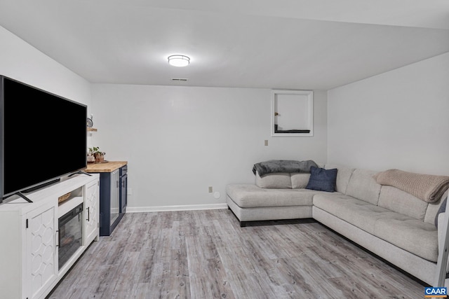 7 Sand Trap Ter, Palmyra, VA 22963 - living room featuring light wood-style flooring and baseboards
