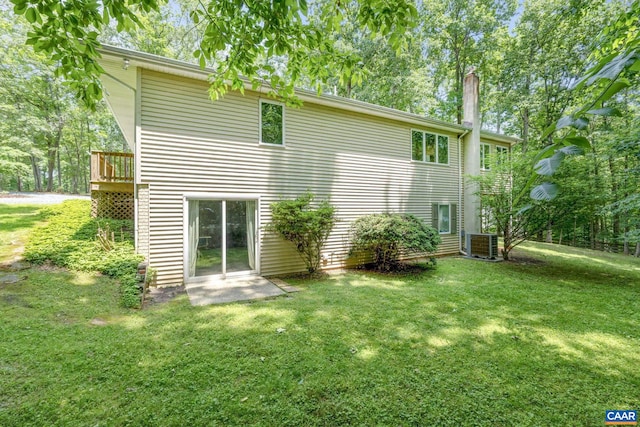 7 Sand Trap Ter, Palmyra, VA 22963 - back of property with a yard, a chimney, and a deck