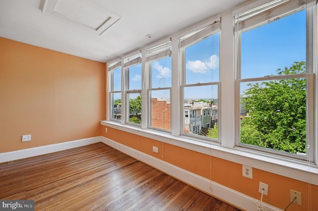 4210 3rd St NW, Washington, DC 20011 - unfurnished room with attic access, baseboards, and wood-type flooring