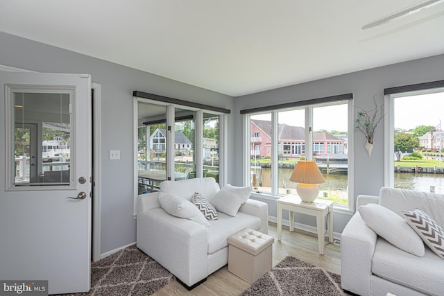 17 Clipper Ct, Ocean Pines, MD 21811 - sunroom with a water view, healthy amount of natural light, wood finished floors, and baseboards