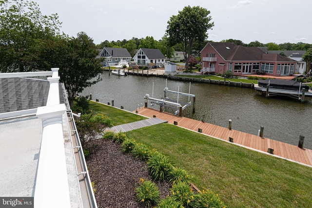 17 Clipper Ct, Ocean Pines, MD 21811 - dock area with a water view, a residential view, boat lift, and a lawn