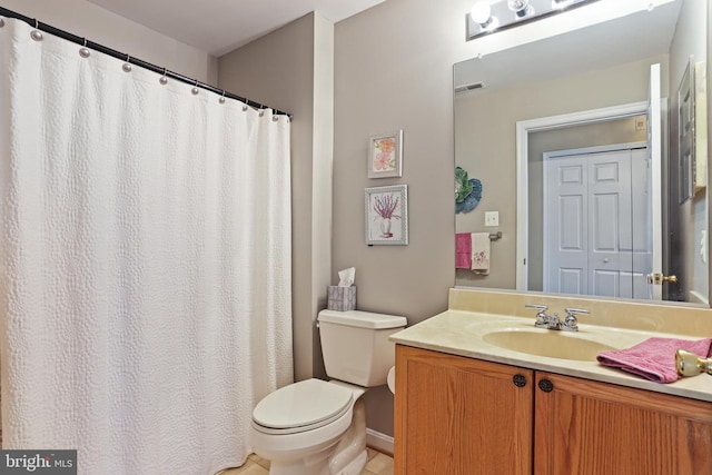 2504 Shelley Cir Unit 1B, Frederick, MD 21702 - bathroom featuring toilet, vanity, and tile patterned flooring