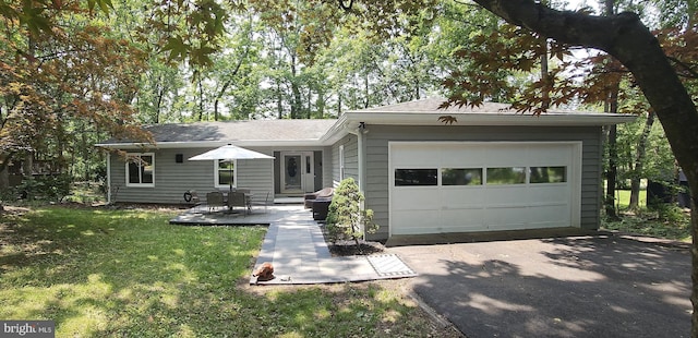 137 Eagle Ct, Locust Grove, VA 22508 - view of front of home featuring asphalt driveway, a front yard, and an attached garage