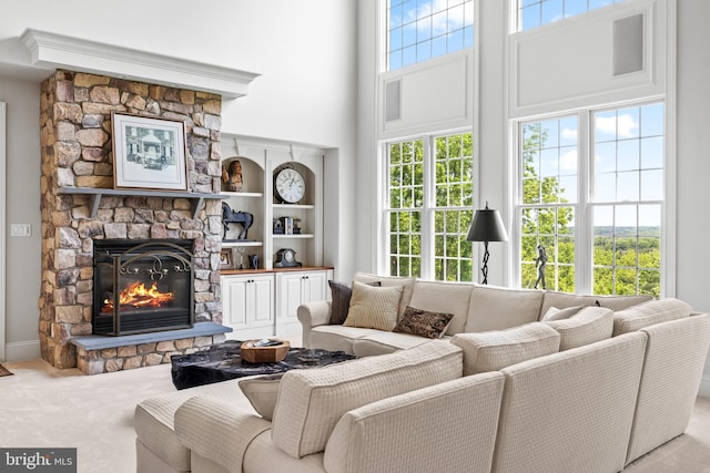 5835 Ridgeview Dr, Doylestown, PA 18902 - living room featuring a high ceiling, a fireplace, and carpet floors