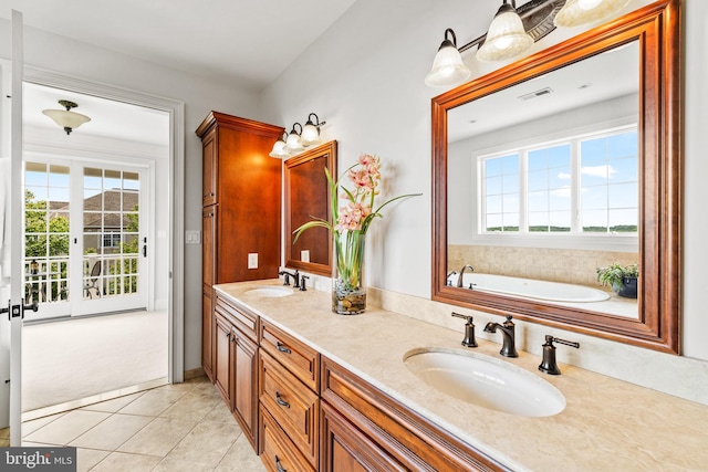 5835 Ridgeview Dr, Doylestown, PA 18902 - bathroom featuring double vanity, tile patterned flooring, and a garden tub