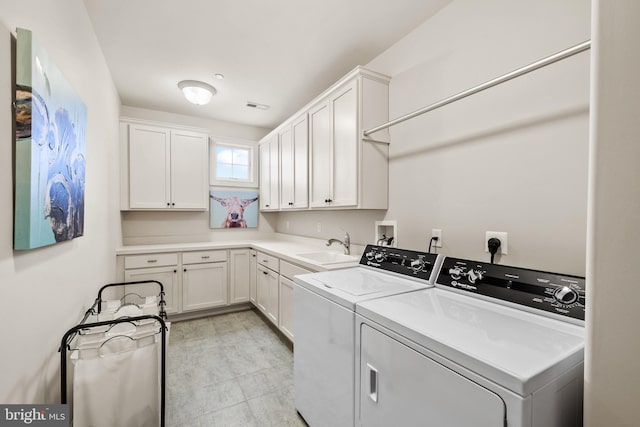5835 Ridgeview Dr, Doylestown, PA 18902 - laundry area with washer and clothes dryer and cabinet space