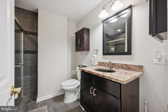 3032 Dillon St, Baltimore, MD 21224 - full bath with toilet, vanity, a tile shower, and baseboards