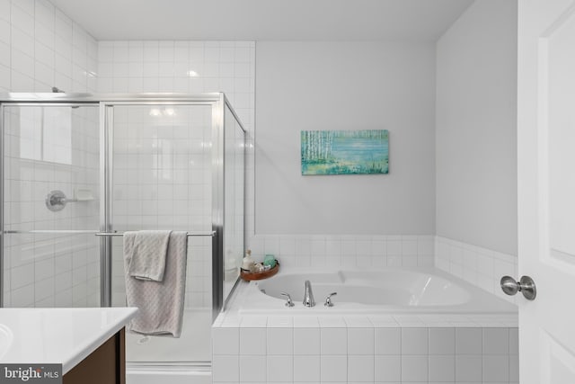 492 Parkland Dr, Stephenson, VA 22656 - full bath with vanity, a garden tub, and a shower stall