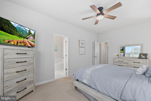 492 Parkland Dr, Stephenson, VA 22656 - bedroom with baseboards, light carpet, ensuite bathroom, and a ceiling fan
