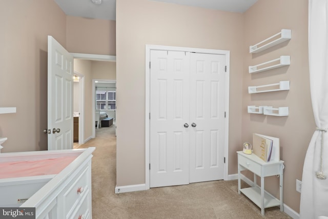 492 Parkland Dr, Stephenson, VA 22656 - bedroom with light carpet, a closet, and baseboards