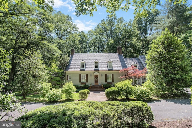 11801 Glen Mill Rd, Potomac, MD 20854 - new england style home featuring a chimney and a high end roof
