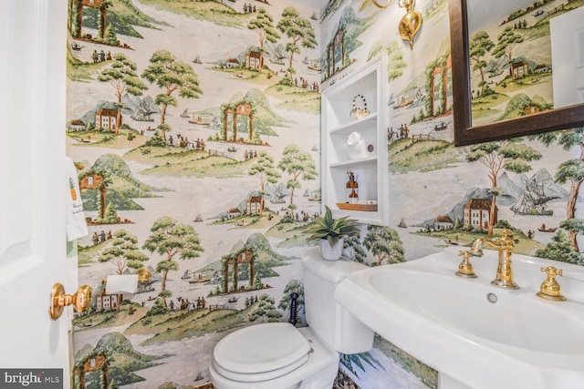 11801 Glen Mill Rd, Potomac, MD 20854 - bathroom featuring a sink, toilet, and wallpapered walls