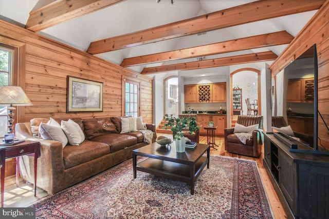 11801 Glen Mill Rd, Potomac, MD 20854 - living area with light wood-type flooring, plenty of natural light, arched walkways, and wooden walls