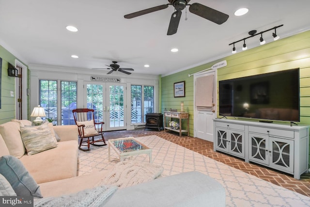 11801 Glen Mill Rd, Potomac, MD 20854 - living room featuring ceiling fan, plenty of natural light, ornamental molding, brick patterned floors, and recessed lighting