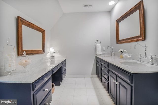 11801 Glen Mill Rd, Potomac, MD 20854 - full bathroom featuring double vanity, vaulted ceiling, and tile patterned flooring