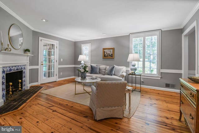 11801 Glen Mill Rd, Potomac, MD 20854 - living area with hardwood / wood-style floors, baseboards, ornamental molding, a high end fireplace, and recessed lighting
