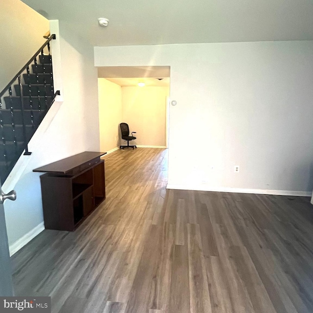 110 S Broadway, Frostburg, MD 21532 - spare room with wood finished floors, stairway, baseboards, and a smoke detector