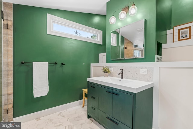 28 New Rd, Doylestown, PA 18901 - bathroom featuring tasteful backsplash, vanity, baseboards, tiled shower, and tile patterned flooring