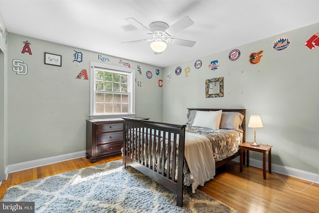 28 New Rd, Doylestown, PA 18901 - bedroom featuring baseboards, wood finished floors, and ceiling fan