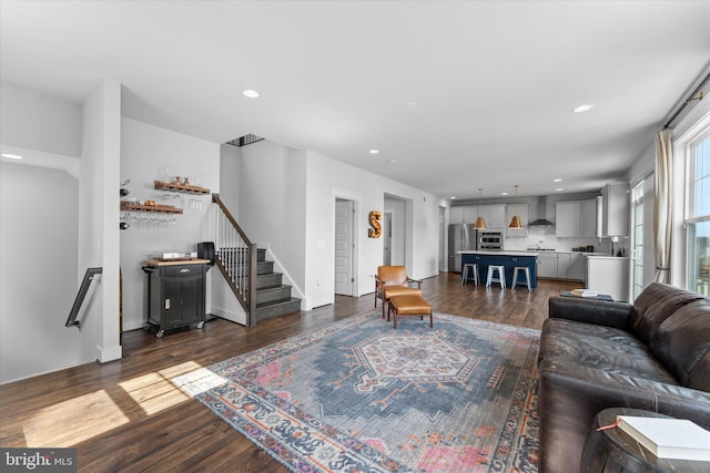 17968 Ridgewood Pl, Round Hill, VA 20141 - living area with dark wood-type flooring, stairs, and recessed lighting