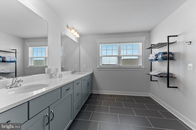 17968 Ridgewood Pl, Round Hill, VA 20141 - bathroom featuring double vanity, tile patterned flooring, and baseboards