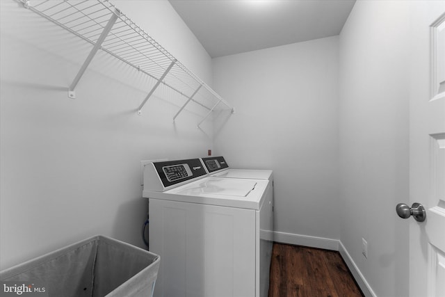 17968 Ridgewood Pl, Round Hill, VA 20141 - washroom with washing machine and dryer, dark wood-style floors, and baseboards