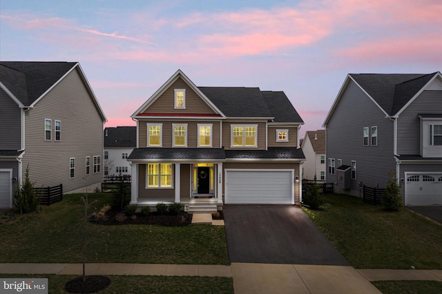 17968 Ridgewood Pl, Round Hill, VA 20141 - traditional-style home featuring driveway, a garage, a front yard, and a porch