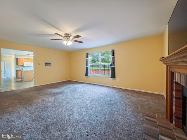 107 Horseshoe Ln, North Wales, PA 19454 - unfurnished living room featuring carpet flooring, a fireplace, a ceiling fan, and baseboards
