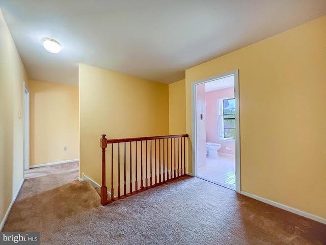 107 Horseshoe Ln, North Wales, PA 19454 - hall with an upstairs landing, carpet floors, and baseboards