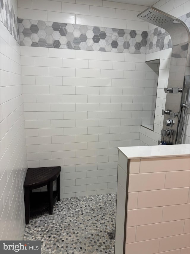 180 E Butler Ave, Vineland, NJ 08360 - full bathroom with a walk in shower and tile walls