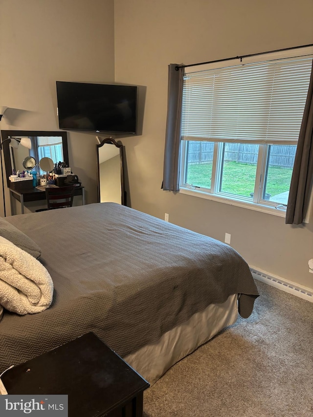 180 E Butler Ave, Vineland, NJ 08360 - carpeted bedroom with a baseboard heating unit