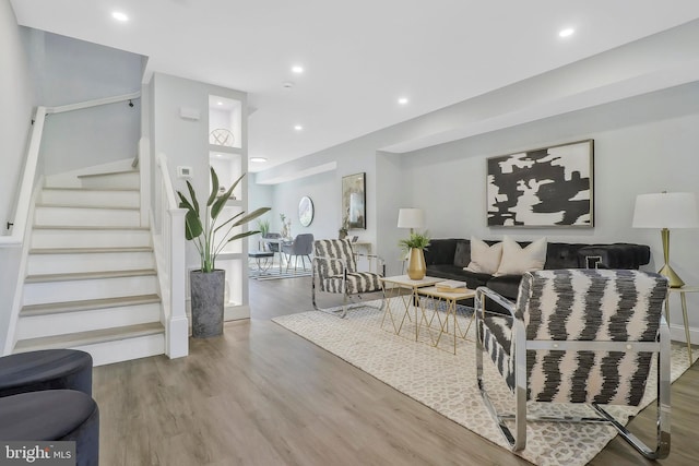 1515 Montana Ave NE, Washington, DC 20018 - living room with stairs, wood finished floors, and recessed lighting