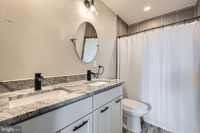 3540 Keswick Rd, Baltimore, MD 21211 - full bath featuring double vanity, toilet, and a shower with curtain