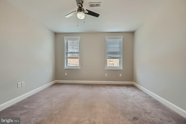 3540 Keswick Rd, Baltimore, MD 21211 - spare room featuring a ceiling fan, carpet floors, and baseboards