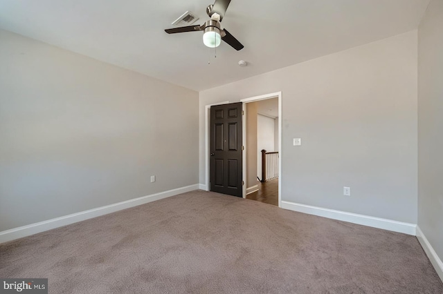 3540 Keswick Rd, Baltimore, MD 21211 - spare room featuring ceiling fan, dark colored carpet, baseboards, and a smoke detector