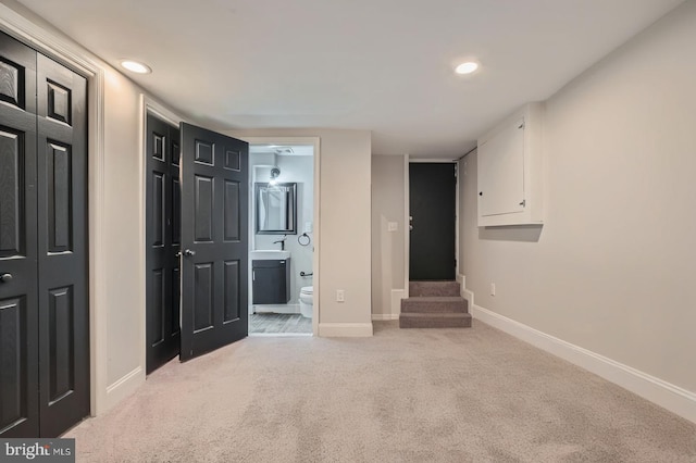 3540 Keswick Rd, Baltimore, MD 21211 - unfurnished bedroom featuring carpet flooring, baseboards, recessed lighting, and ensuite bathroom