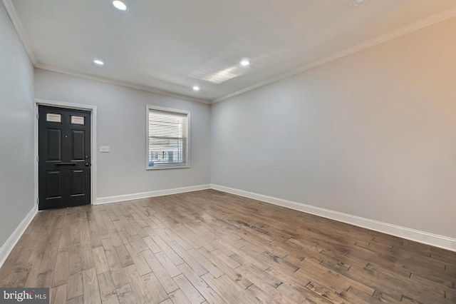 3540 Keswick Rd, Baltimore, MD 21211 - entrance foyer with crown molding, baseboards, wood finished floors, and recessed lighting