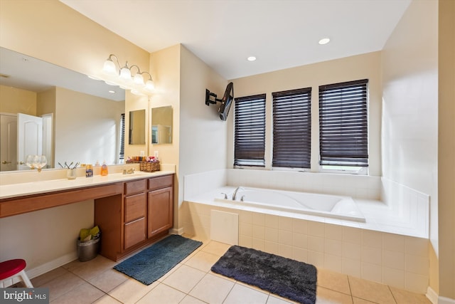 7306 Sudley Ave, Brandywine, MD 20613 - bathroom featuring vanity, a garden tub, and tile patterned flooring
