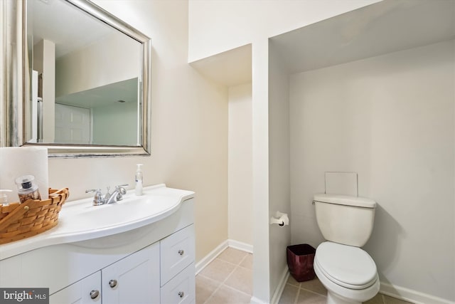 7306 Sudley Ave, Brandywine, MD 20613 - bathroom featuring vanity, toilet, tile patterned floors, and baseboards