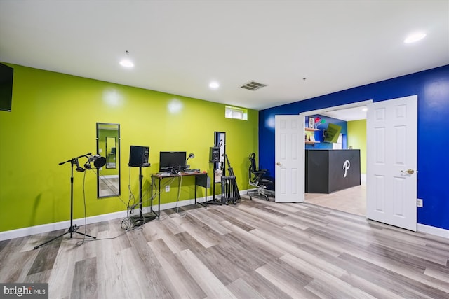 7306 Sudley Ave, Brandywine, MD 20613 - exercise area featuring wood finished floors, baseboards, and recessed lighting