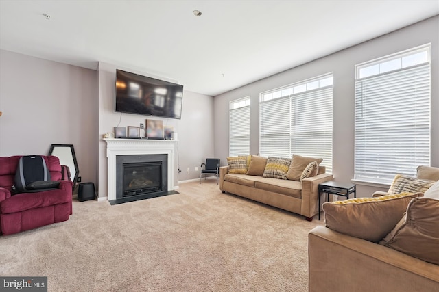 7306 Sudley Ave, Brandywine, MD 20613 - carpeted living room with plenty of natural light and a fireplace with flush hearth