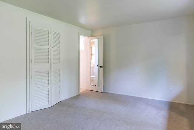 555 Hillcrest Ave, State College, PA 16803 - unfurnished bedroom featuring carpet floors, a closet, and baseboards