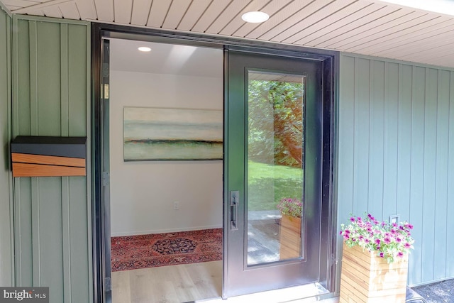 555 Hillcrest Ave, State College, PA 16803 - doorway to outside featuring wood finished floors, wood ceiling, and recessed lighting