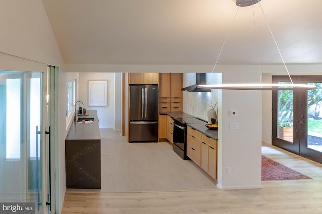 555 Hillcrest Ave, State College, PA 16803 - kitchen featuring freestanding refrigerator, black range with electric cooktop, wall chimney exhaust hood, tasteful backsplash, and light brown cabinetry