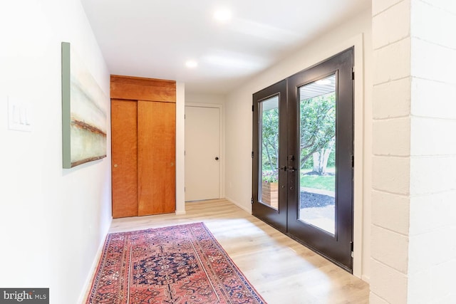 555 Hillcrest Ave, State College, PA 16803 - foyer entrance with light wood-style floors, french doors, recessed lighting, and baseboards
