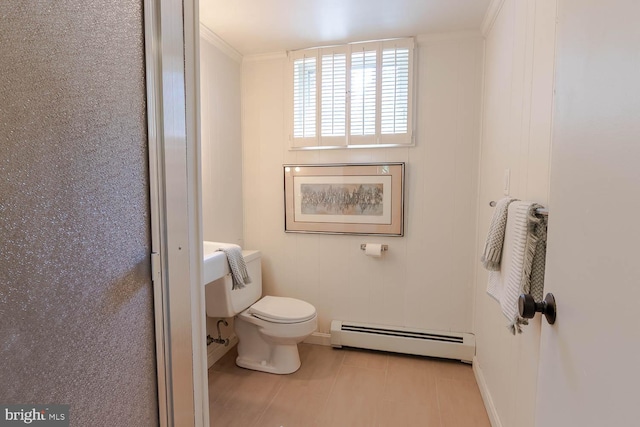 555 Hillcrest Ave, State College, PA 16803 - bathroom featuring baseboard heating, toilet, baseboards, and tile patterned floors