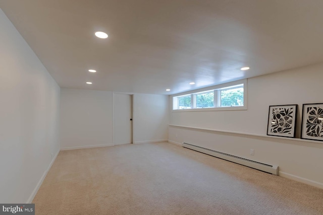 555 Hillcrest Ave, State College, PA 16803 - basement featuring a baseboard heating unit, recessed lighting, carpet flooring, and baseboards