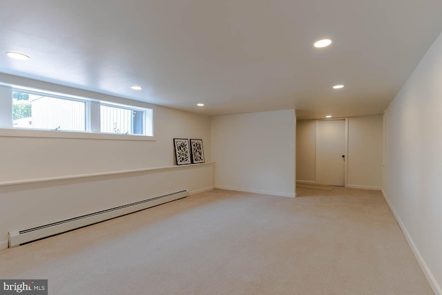 555 Hillcrest Ave, State College, PA 16803 - below grade area with a baseboard heating unit, recessed lighting, baseboards, and carpet flooring