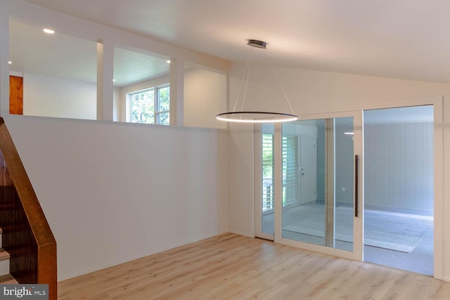 555 Hillcrest Ave, State College, PA 16803 - spare room featuring wood finished floors and lofted ceiling